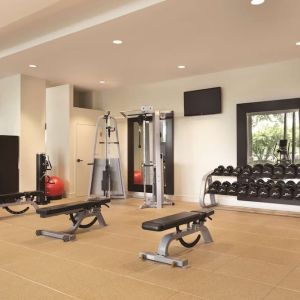 Fully equipped fitness center at Hilton Boston Logan Airport.