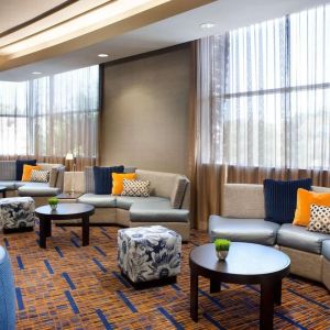 Lobby lounge and workspace at Sonesta Emeryville Oakland.