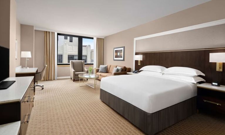 Bright and spacious day use room with work desk at Hilton Indianapolis Hotel & Suites.