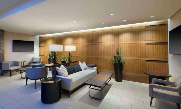 Lobby lounge and workspace at Hilton Indianapolis Hotel & Suites.