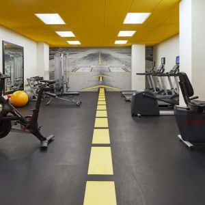 Fully equipped fitness center at H Hotel Los Angeles, Curio Collection By Hilton.