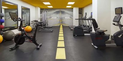 Fully equipped fitness center at H Hotel Los Angeles, Curio Collection By Hilton.