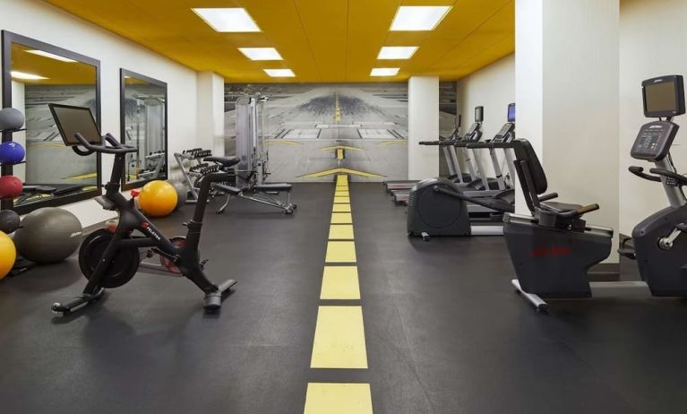 Fully equipped fitness center at H Hotel Los Angeles, Curio Collection By Hilton.