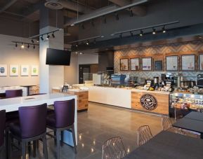 On-site coffee shop, perfect for coworking at H Hotel Los Angeles, Curio Collection By Hilton.