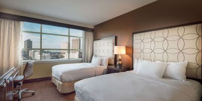 Day use twin room with workspace at Hilton Baton Rouge Capitol Center.