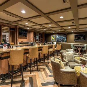 Dining area with lounge seating at Hilton Baton Rouge Capitol Center.