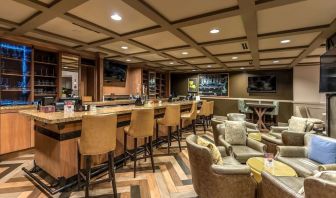Dining area with lounge seating at Hilton Baton Rouge Capitol Center.