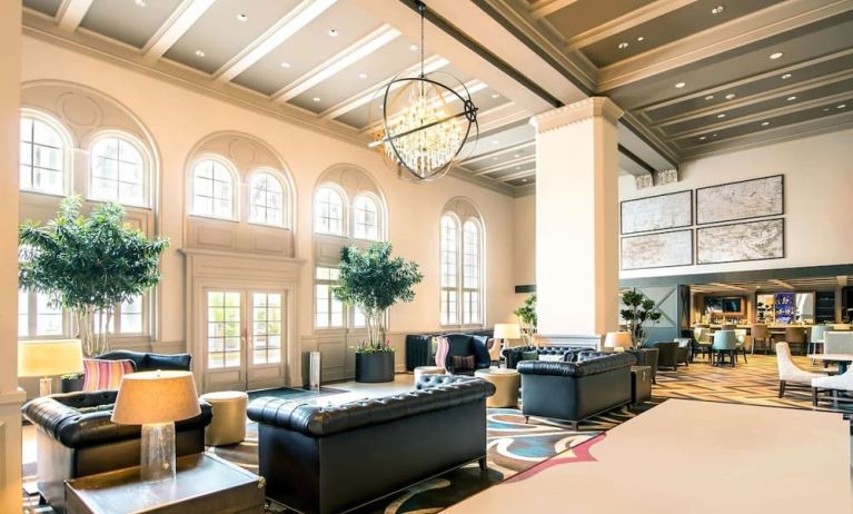 Hotel lobby with comfortable seating and workspace, perfect for coworking at Hilton Baton Rouge Capitol Center.