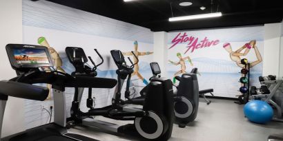 Fitness center available at Hotel Studio Allston.