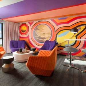 Bold design in the living room curated by talented artists at Hotel Studio Allston.