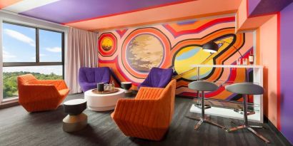 Bold design in the living room curated by talented artists at Hotel Studio Allston.