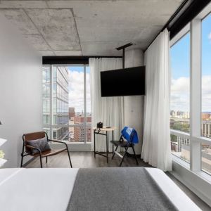 Day use room with a view of the city at Moxy Boston Downtown.