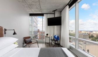 Day use room with a view of the city at Moxy Boston Downtown.