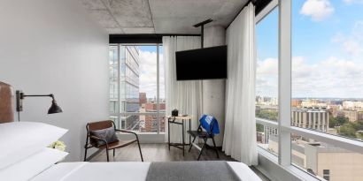 Day use room with a view of the city at Moxy Boston Downtown.