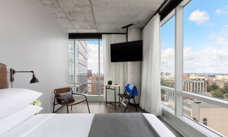 Day use room with a view of the city at Moxy Boston Downtown.
