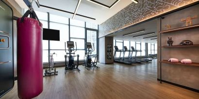 Fitness center with natural light at Moxy Boston Downtown.