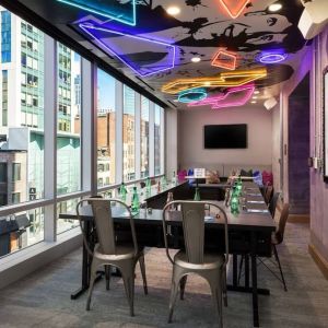 Meeting room with natural light at Moxy Boston Downtown.
