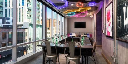 Meeting room with natural light at Moxy Boston Downtown.