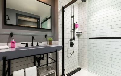 Private guest bathroom with shower at Moxy Boston Downtown.