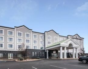 Exterior and parking area at Park Manor Hotel.