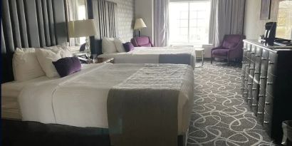 Day use twin room with lounge seating at Park Manor Hotel. 