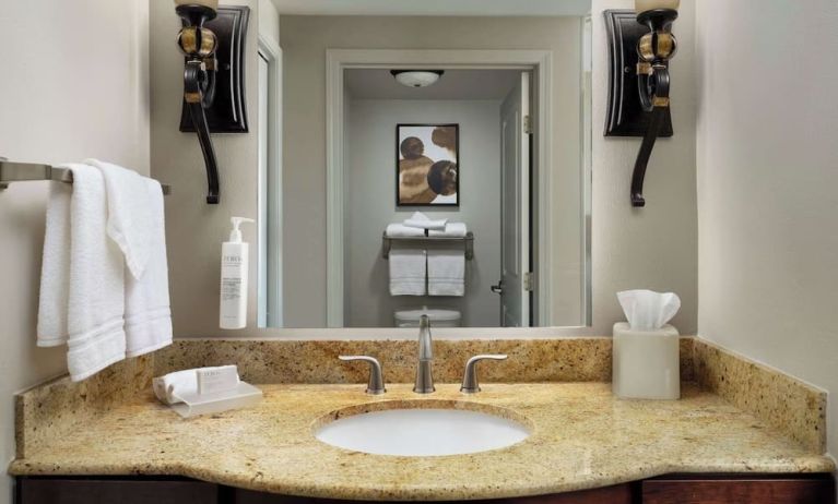 Private guest bathroom with free toiletries at Homewood Suites By Hilton Shreveport / Bossier City, LA.