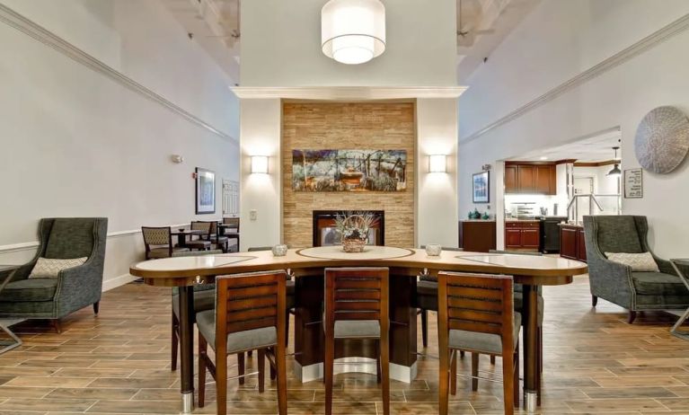 Lobby lounge and workspace at Homewood Suites By Hilton Newark-Cranford.