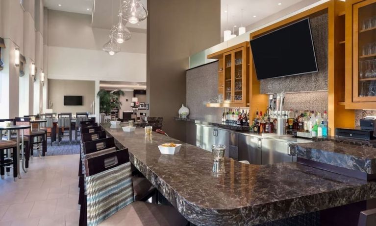 On-site bar at Hampton Inn & Suites Rosemont Chicago O'Hare.