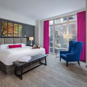 Day use room with work desk and natural light at Royalton Park Avenue.