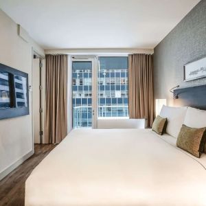 Day use room with balcony at The Bernic Hotel New York City, Tapestry Collection By Hilton.