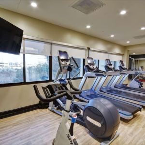 Well equipped fitness center at Embassy Suites By Hilton Santa Clara Silicon Valley.