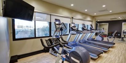 Well equipped fitness center at Embassy Suites By Hilton Santa Clara Silicon Valley.