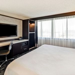 Day use room with work desk and natural light at Embassy Suites By Hilton Santa Clara Silicon Valley.