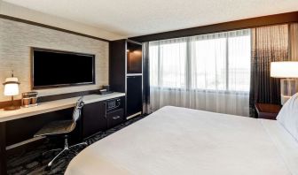 Day use room with work desk and natural light at Embassy Suites By Hilton Santa Clara Silicon Valley.