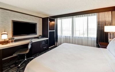 Day use room with work desk and natural light at Embassy Suites By Hilton Santa Clara Silicon Valley.