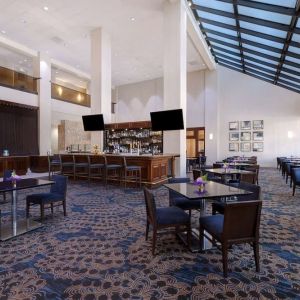 Spacious hotel bar perfect for coworking at Embassy Suites By Hilton Santa Clara Silicon Valley.