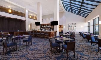Spacious hotel bar perfect for coworking at Embassy Suites By Hilton Santa Clara Silicon Valley.