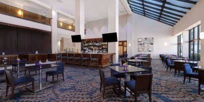 Spacious hotel bar perfect for coworking at Embassy Suites By Hilton Santa Clara Silicon Valley.