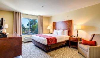 Dayroom with TV and natural light at Comfort Inn Pomona Near Fairplex.