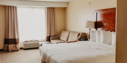 Delux king room with natural light at Comfort Inn Pomona Near Fairplex.