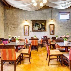 Dining area perfect for coworking at Comfort Inn Pomona Near Fairplex.