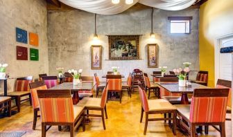 Dining area perfect for coworking at Comfort Inn Pomona Near Fairplex.