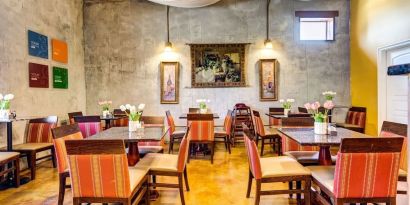 Dining area perfect for coworking at Comfort Inn Pomona Near Fairplex.