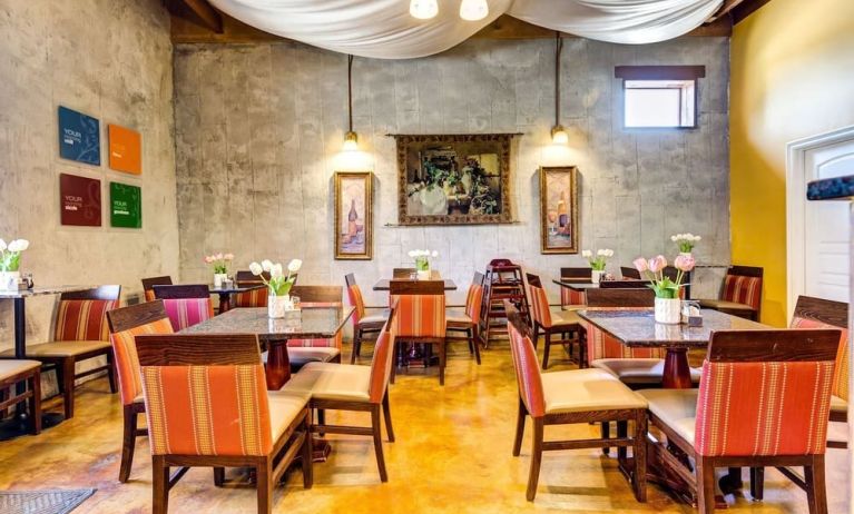 Dining area perfect for coworking at Comfort Inn Pomona Near Fairplex.