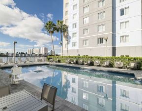 Stunning outdoor pool at Homewood Suites By Hilton Miami Airport-Blue Lagoon.