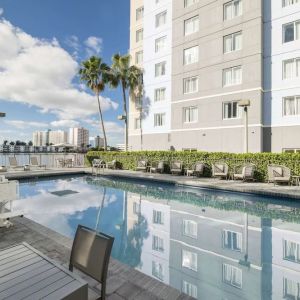 Stunning outdoor pool at Homewood Suites By Hilton Miami Airport-Blue Lagoon.