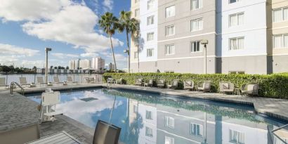Stunning outdoor pool at Homewood Suites By Hilton Miami Airport-Blue Lagoon.