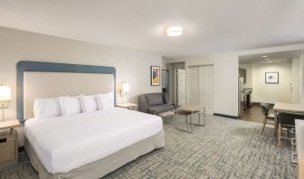Spacious day use room with sofa and work desk at Homewood Suites By Hilton Miami Airport-Blue Lagoon.