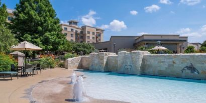 One of the 3 outdoor pools at Hilton San Antonio Hill Country.