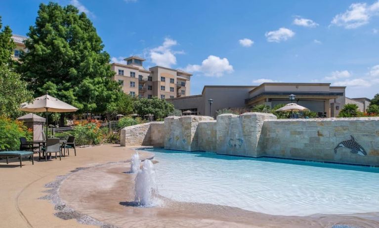 One of the 3 outdoor pools at Hilton San Antonio Hill Country.